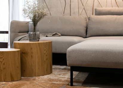 Solianero three-seater sofa with a beige wicker pouf