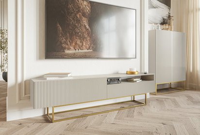 Veldio TV cabinet with a milled front and a 175 cm recess. Gray beige with gold legs.