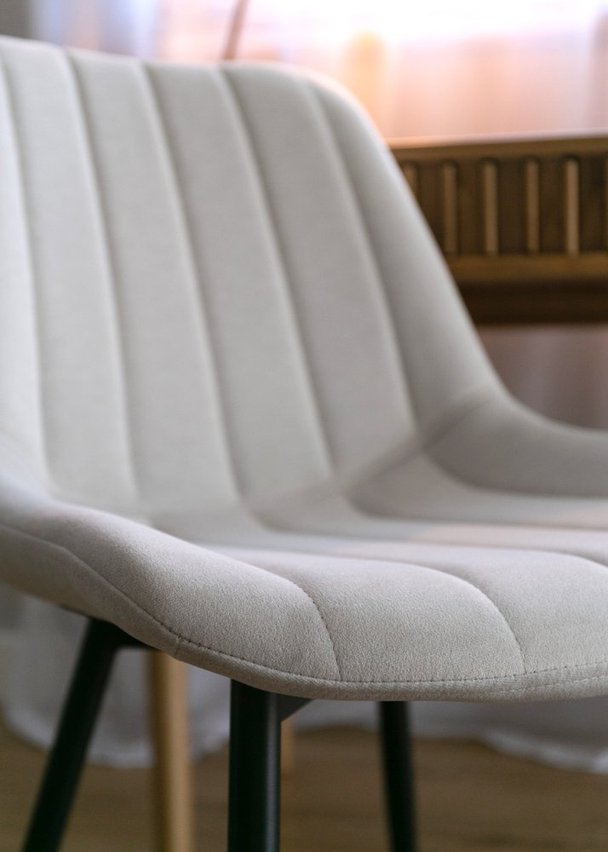 Roploy upholstered chair in cream velvet