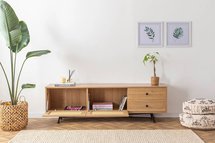 Crattale TV cabinet 180 cm with a natural rattan front